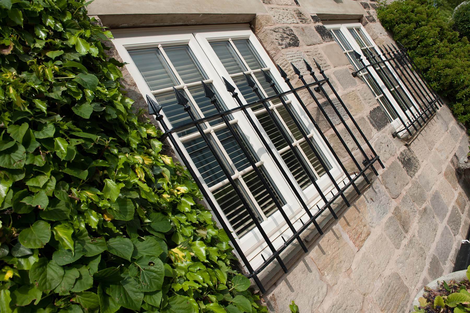 casement window with black railing